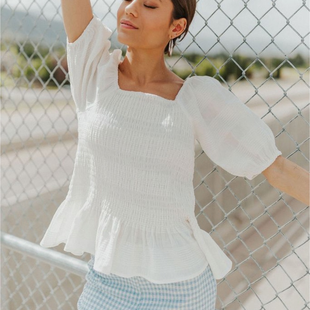 Shop henly smocked peplum top size large